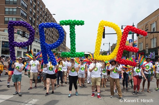 Pride spelled out with colored balloons